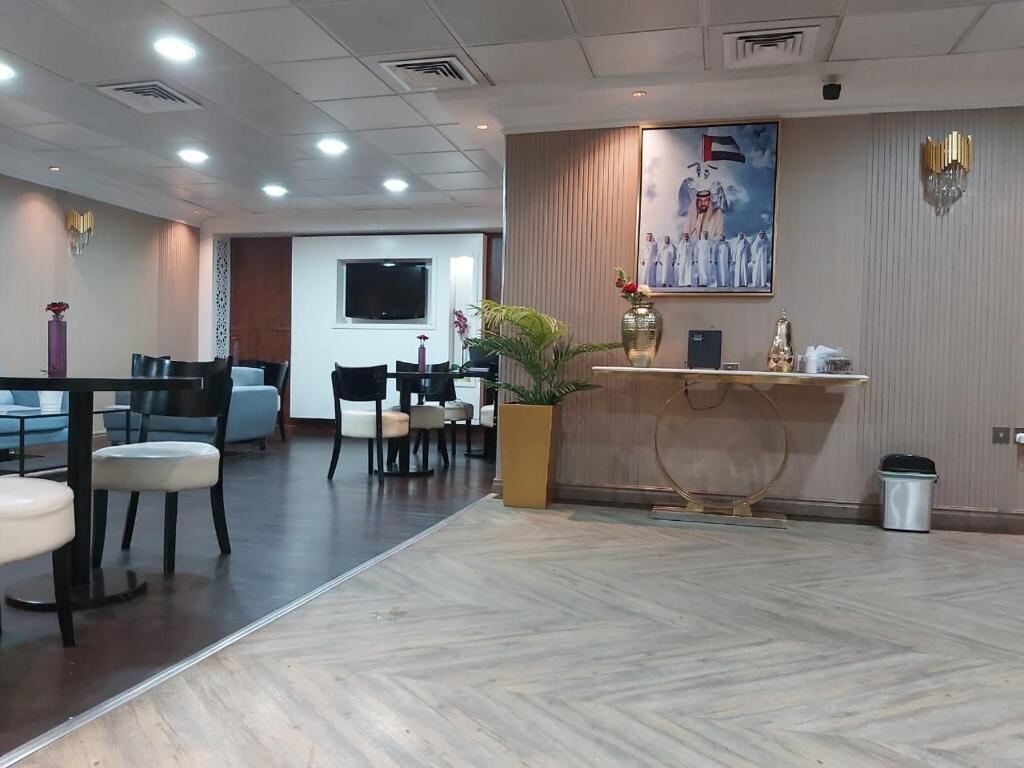 Reception lounge with seating at Arabian Hotel Apartments in Ajman